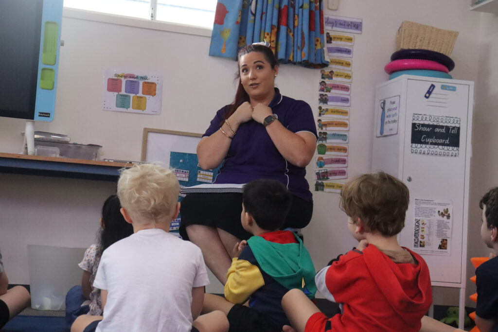 Child enjoying bedtime story showing how repetition in early childhood builds emotional security